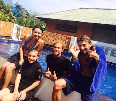 Divers pose after a pool session.